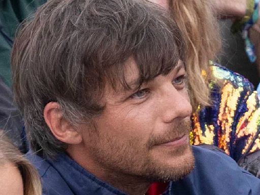 Louis Tomlinson brings a TV to Glastonbury for England match