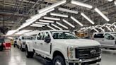 US manufacturing output rises, outlook for factories weak
