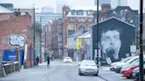 British Rapper Aitch Working to ‘Fix’ Manchester Mural of Joy Division’s Ian Curtis That Was Painted Over for His Album...