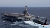 What does the US carrier strike group near Israel bring? Tremendous firepower and an unmistakable message