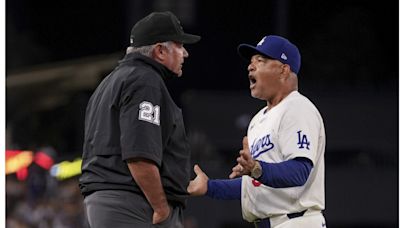 Dodgers blow lead, Phillies score 5 after questionable call at third base