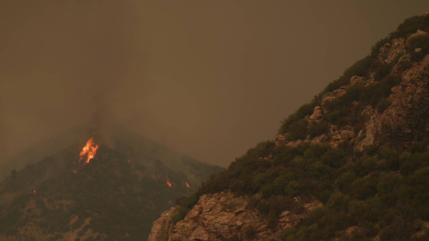 Thousands evacuate as wildfires rage outside Los Angeles and Reno, Nevada