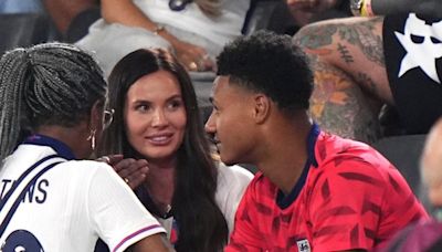 Ollie Watkins and girlfriend share a passionate kiss after England victory