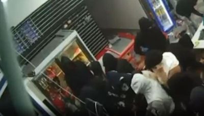 Mob ravages California mini-mart during flash robbery near airport, shocking video shows