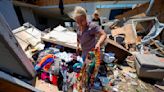 In a north Texas county, dazed residents sift through homes mangled by a tornado