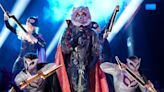 Wolf revealed as iconic Grammy winner in chaotic DC Superheroes week on The Masked Singer