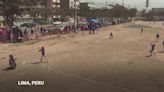 Baseball becomes a shelter for Venezuelan children in soccer crazy Peru