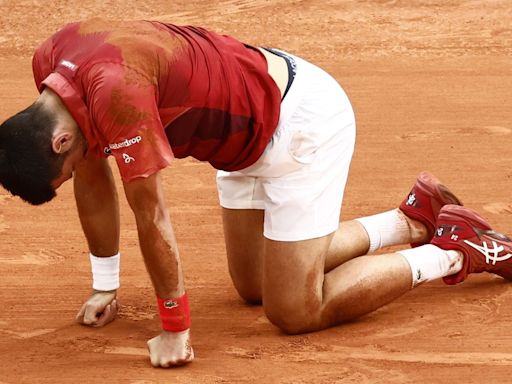 Novak Djokovic overcomes injury scare in five-set thriller at French Open