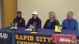 Student-athletes at RC Christian sign letters of intent