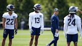 New Seattle coach Mike Macdonald takes it all in during first day of Seahawks rookie minicamp