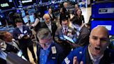 Dow Jones hits record milestone as US bets on faster rate cuts