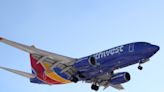 A nurse and her boyfriend got high fives from other Southwest Airlines passengers after they saved a man's life on a flight to Baltimore, reports say