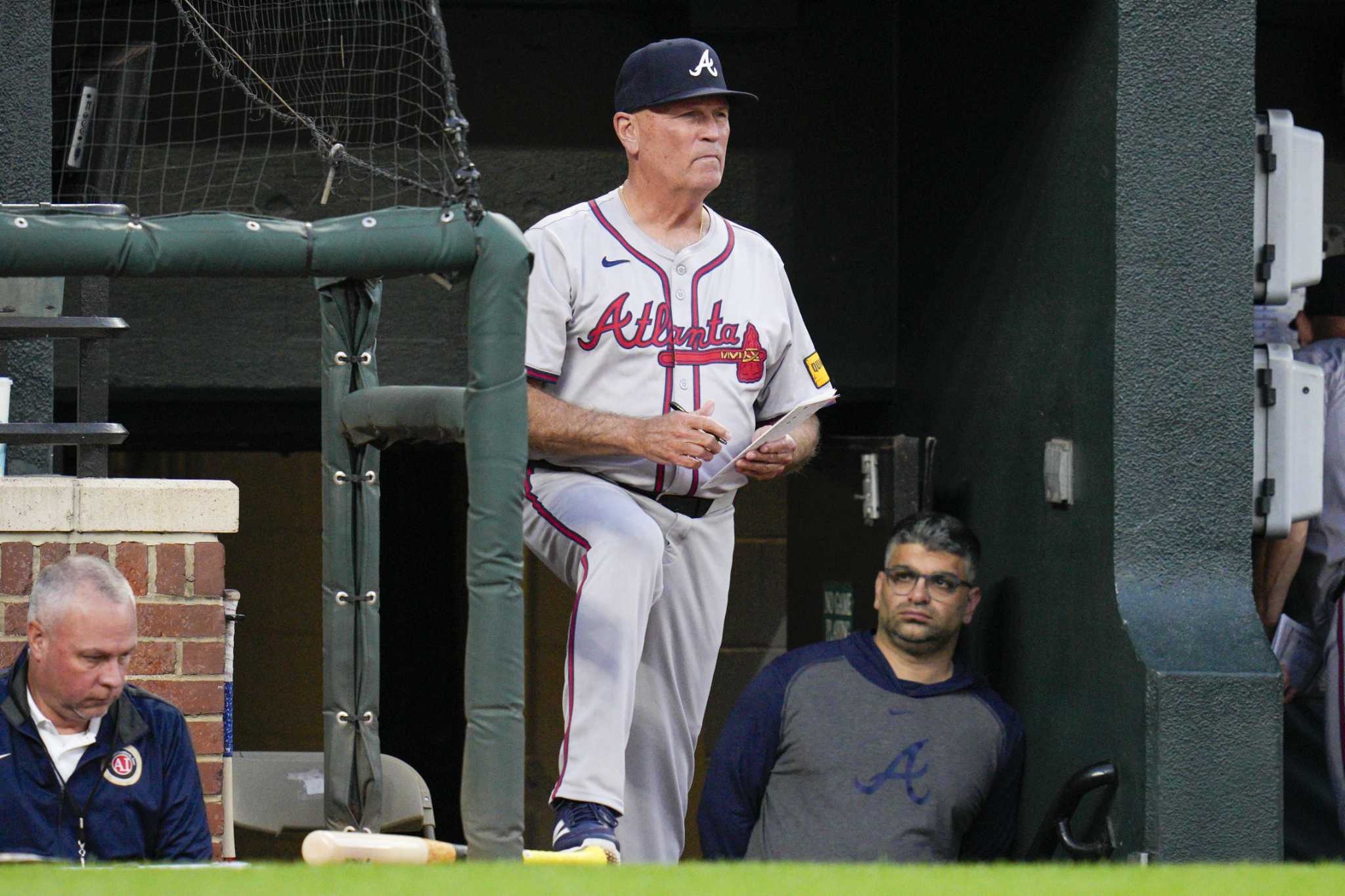 Braves manager Brian Snitker smiles 1 day after being hit below the belt by a foul ball