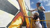 Teen artists bring new downtown mural to life