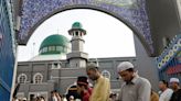 Indonesian, Malaysian Muslims celebrate Eid al-Fitr as COVID fears recede