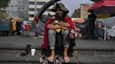 Venezuelan migrants in Mexico worry for their loved ones as political unrest roils their homeland