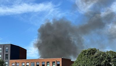 Explosions heard & huge plumes of smoke fill sky as fire breaks out in city