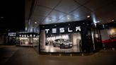 Tesla's automotive revenue falls 7% in Q2, robotaxi timing unclear