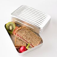 A classic lunch box made of metal, often with a handle and latch Can come in a variety of designs, from vintage to modern May not be as well-insulated as other types of lunch boxes