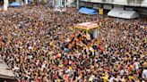 Pictured: Millions of Filipinos swarm statue of Jesus for Black Nazarene procession