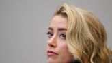 Amber Heard tearfully says she's been 'humiliated,' received 'death threats' amid Johnny Depp trial