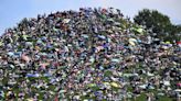 Fans swarm hill in Munich, claiming a high perch for watching Taylor Swift concert for free