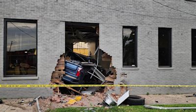 Person taken to hospital after pickup truck crashes into building in Henry County