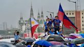 Undeterred by downpour, groups march to reject Marcos’ Bagong Pilipinas