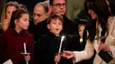 Deep breath, Louis! Princess of Wales looks on as Prince blows out candle at Christmas carol service