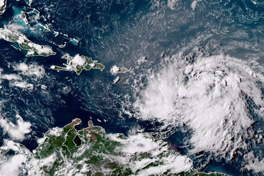 Tropical Storm Ernesto batters northeast Caribbean and aims at Puerto Rico as it strengthens