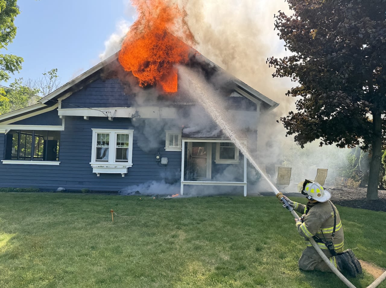 South Haven police rescue family dog as flames roar from second floor