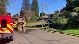Tualatin Valley firefighters battle house fire in Tigard, smoke visible across town