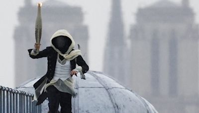 Assassins Creed? Who was the masked torchbearer at the 2024 Paris Olympics Opening Ceremony?