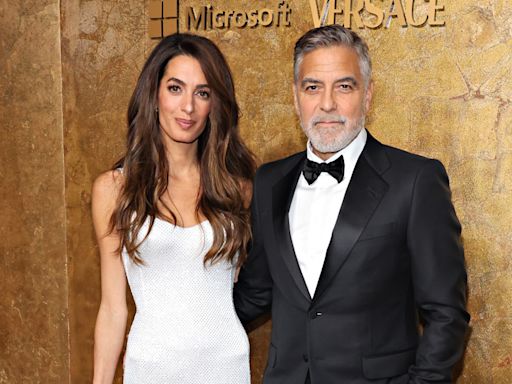 George and Amal Clooney refuse to explain the idea of fame to their kids