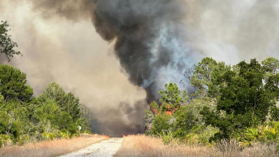 Brush fire prompts evacuations of several homes in Lake Placid area