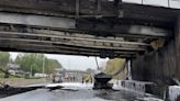 Traffic snarled as workers begin removing fire-damaged bridge over I-95 in Connecticut