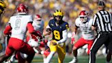 No. 2 Michigan rolls on without suspended coach Jim Harbaugh, routing UNLV 35-7