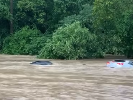 WATCH: Flooding forces cars underwater near Manchester