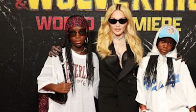 Madonna makes surprise red carpet appearance with twin daughters