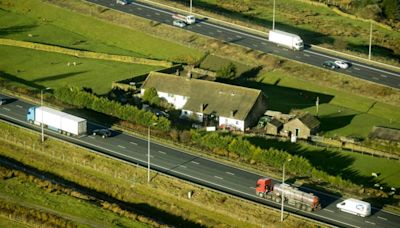 A house sits slap bang in the middle of the M62. Why is it there?