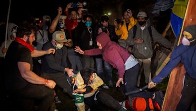 Dueling protesters clash at UCLA hours after police clear pro-Palestinian demonstration at Columbia