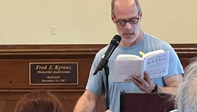 Brush with death informs Junger's standing-room-only City Hall talk
