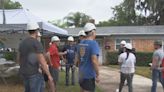 Jacksonville executives gather to repair Navy veteran’s home in Atlantic Beach