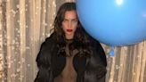 Irina Shayk Wears Sheer Top for Snowy Skating Outing with Friends to Celebrate Her Birthday