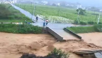 Floods and landslides kill nine in China’s south as drought hits north