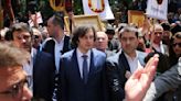 Georgia's prime minister joins tens of thousands in a march to promote 'family purity'