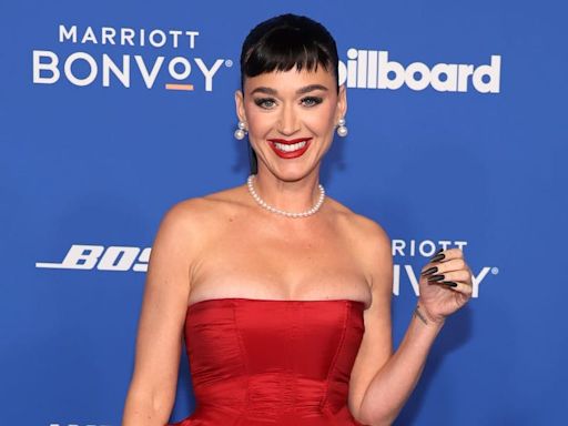 Katy Perry released another teaser for her new song 'Woman's World.' People can't decide whether she's so back or desperate to relive her glory days.