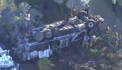 Vacuum truck driver hospitalized after rollover crash on Don Shula Expressway