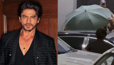 WATCH: Shah Rukh Khan returns to Mumbai after getting discharged from Ahmedabad hospital; hides under umbrella to avoid paps