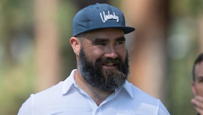 Watch Jason Kelce Sign Someone's Baby at Celebrity Golf Tournament